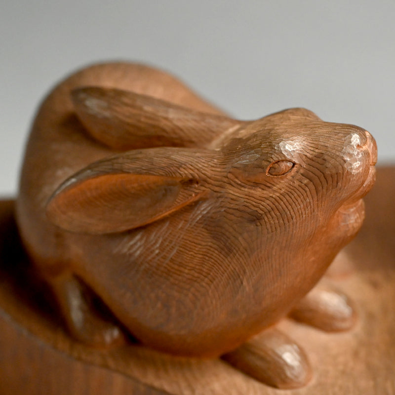 Serenity in Wood, a Carved Rabbit Okimono