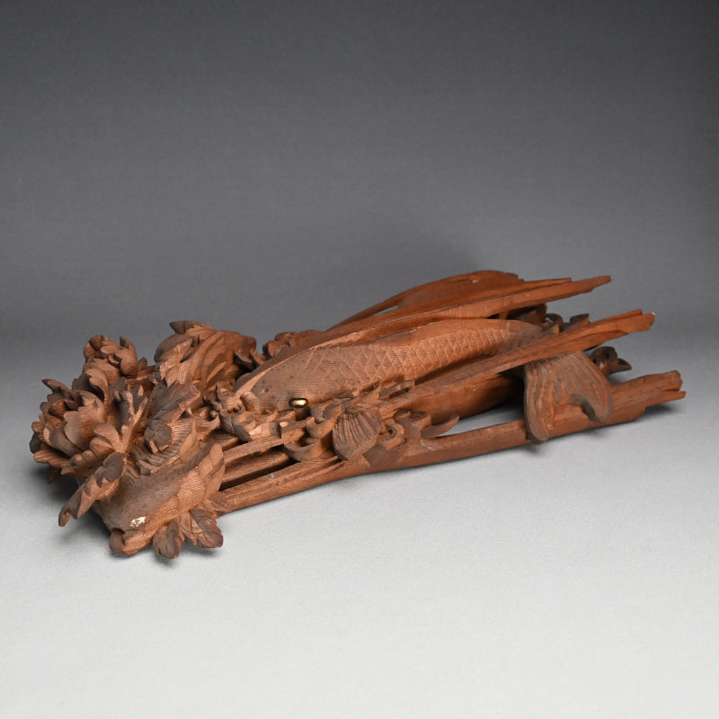 Carved Image of Carp Ascending a Waterfall