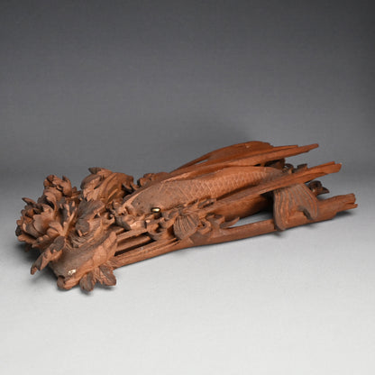 Carved Image of Carp Ascending a Waterfall