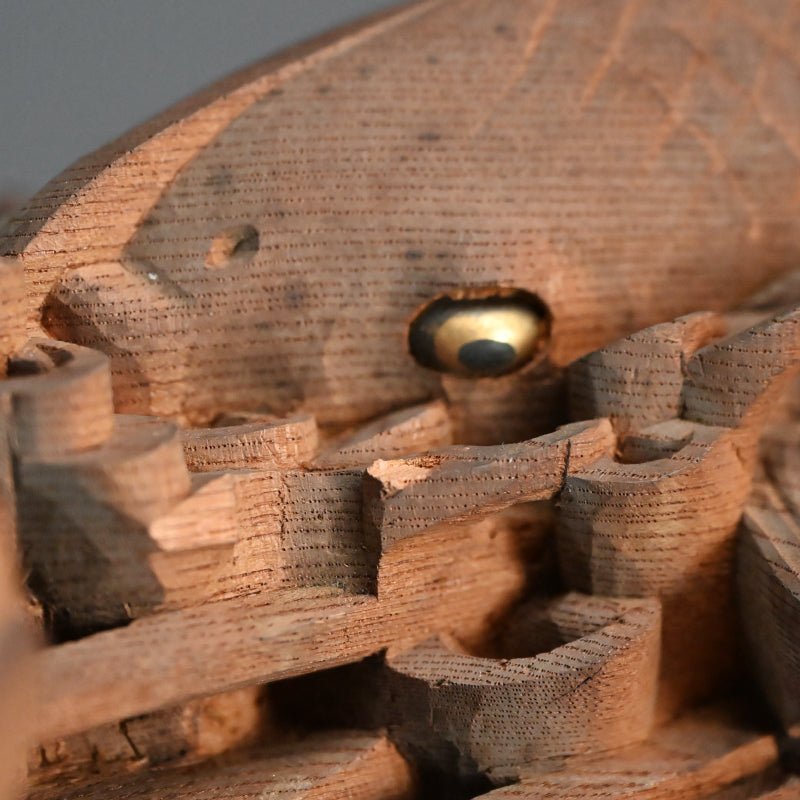 Carved Image of Carp Ascending a Waterfall